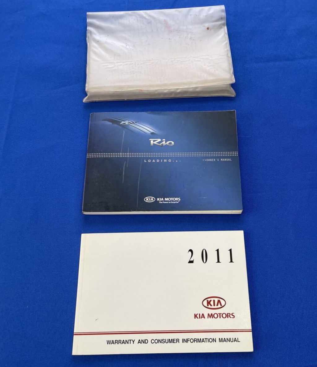 Picture of: Kia Rio Owners Manual with Case Sleeve  Factory User Guide Books Car  OEM