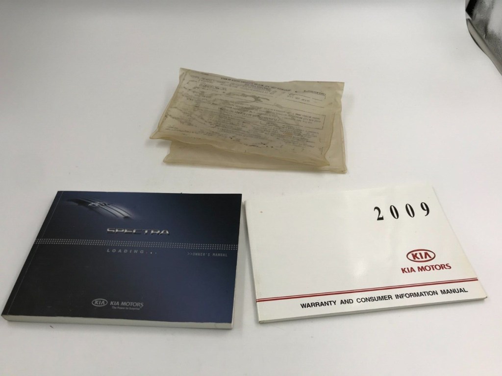 Picture of: Kia Spectra Owners Manual Set With Case OEM OM